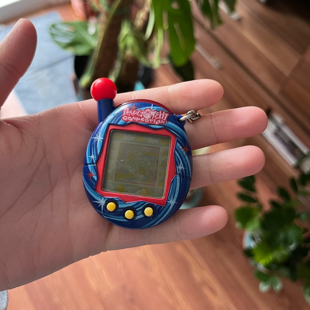 Vintage Rare Tamagotchi Connection Red Blue Swirl Star V4